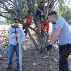 Guys working outdoors