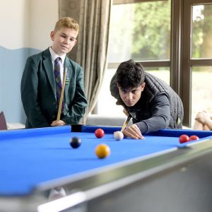 children playing pool