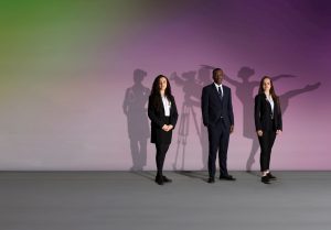 3 students in purple background