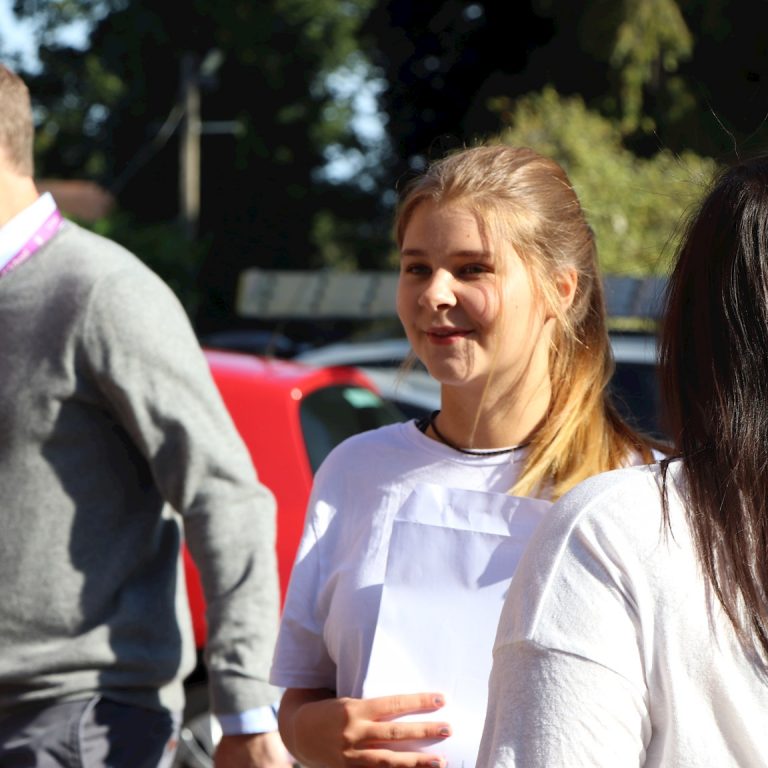 children with their exam results