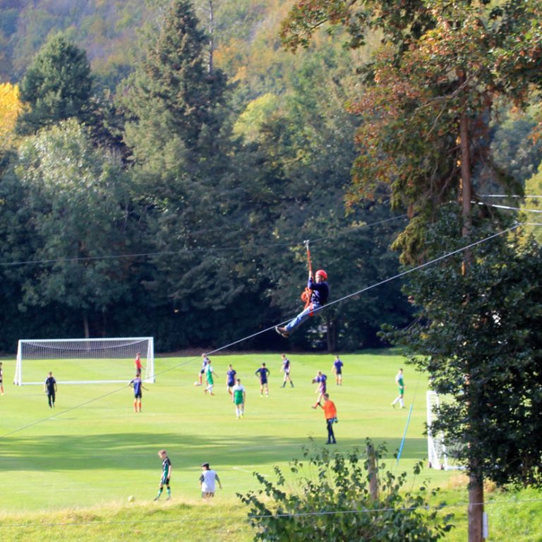 children playing on a big football field