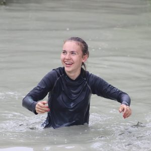 children standing up in a lake