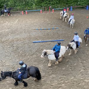 children riding horses