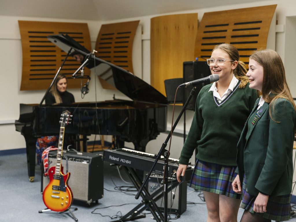 students singing