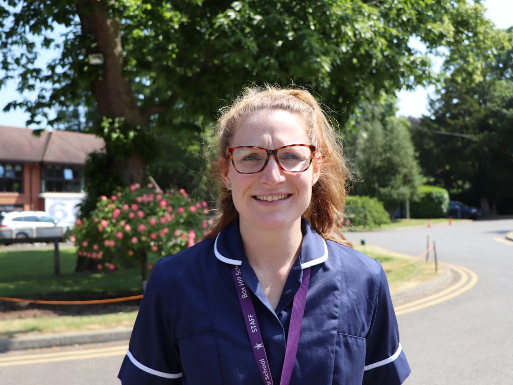 lady wearing a box hill lanyard