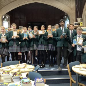 children holding books